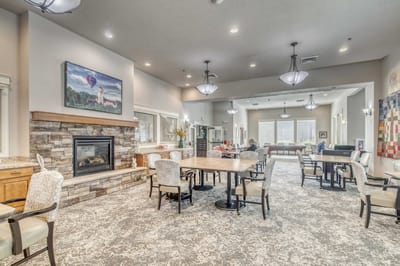 Interior dining area with residents and staff