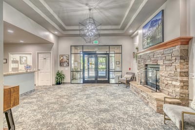 Interior lobby with seating and fireplace