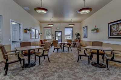 Interior dining area with tables and chairs