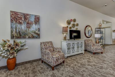Bright common area with comfortable seating and decor
