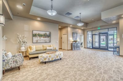Bright and inviting common area with seating and artwork