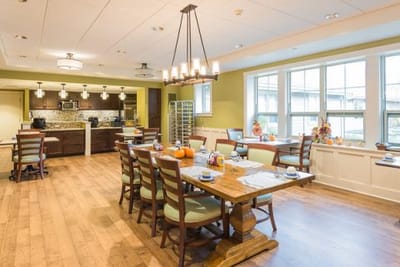 Bright dining room with wooden tables and chairs