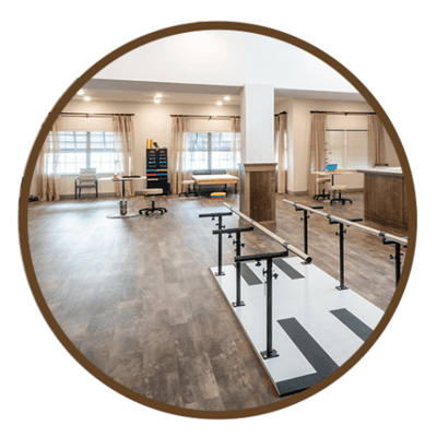 Physical therapy room with exercise equipment