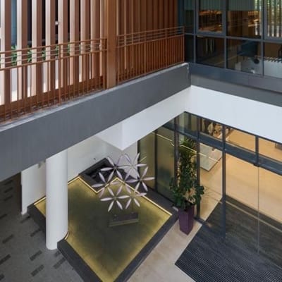 Modern interior view of a facility lobby with artwork