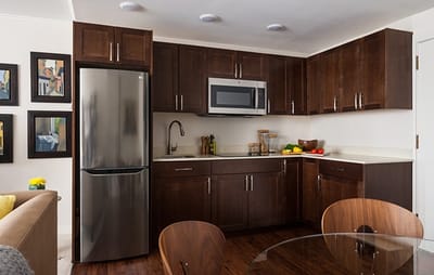 Modern kitchen interior with appliances and furniture