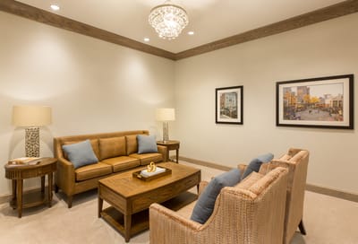 Interior lounge area with comfortable seating and artwork