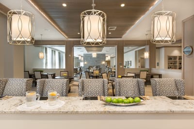 Interior view of a modern dining room with seating