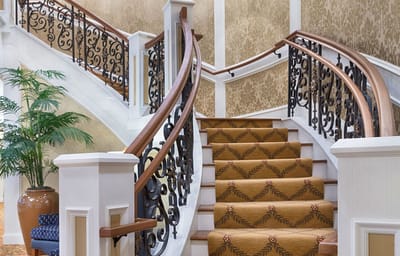 Elegant staircase in a senior living facility