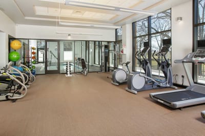 Modern fitness room with exercise equipment