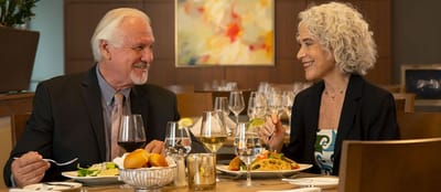 Couple enjoying a meal in the dining room
