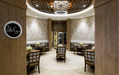 Interior view of a wine cellar with seating