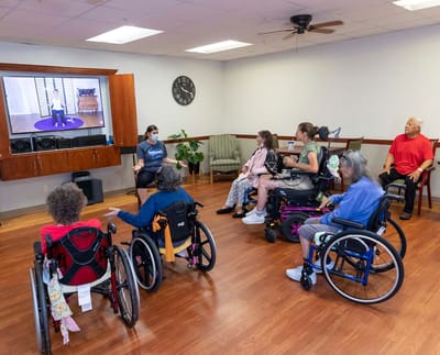 Residents participating in a virtual exercise session