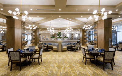 Interior view of a dining area with tables and decor