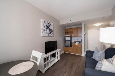 Cozy resident room with a kitchenette and living area