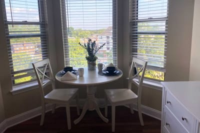 Bright dining corner with a view and cozy decor