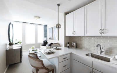 Stylish interior of a private resident room with kitchenette