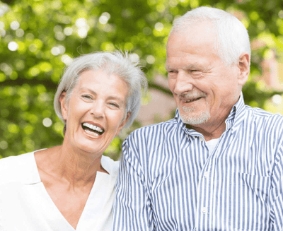 Happy senior couple enjoying a moment outdoors
