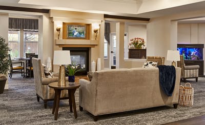 Comfortable common area with seating and fireplace