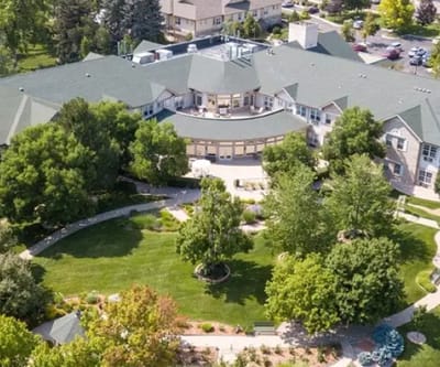 Aerial view of an assisted living facility with gardens