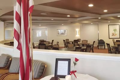 Interior view of a dining area with American flag