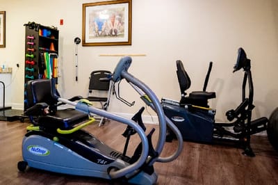 Fitness equipment in a bright exercise room