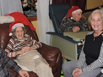 Residents enjoying a festive holiday gathering