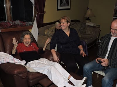 Residents enjoying conversation in a cozy living room