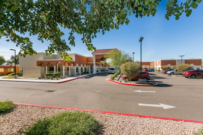 Front entrance of Mission Palms Post Acute with parking area