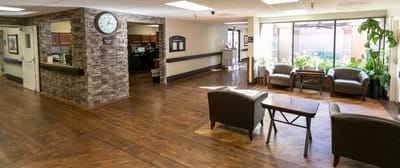 Common area with seating and a view of the outdoors