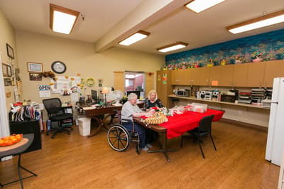 Residents engaging in an activity in the dining room