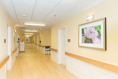 Interior hallway with artwork and seating