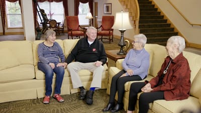 Residents enjoying conversation in a common area