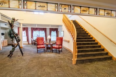 Common area with a staircase and seating