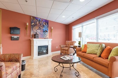 Cozy common area with a fireplace and seating