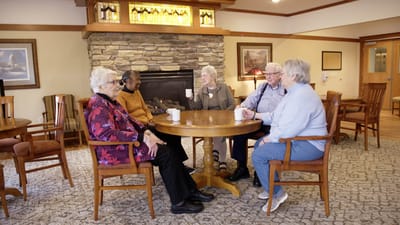 Residents enjoying conversation in a common area
