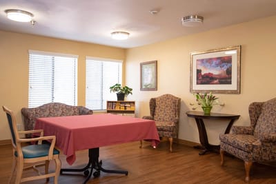 Cozy common area with seating and artwork