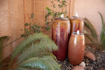 Decorative outdoor water feature with plants
