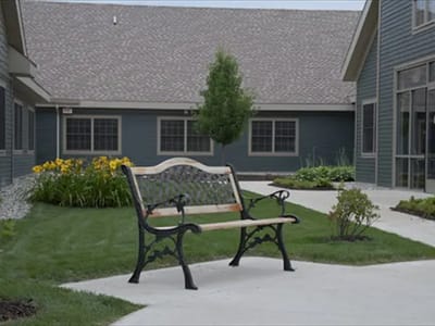 Outdoor seating area in a landscaped courtyard
