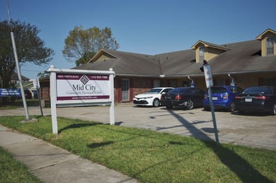 Exterior view of Mid City Community Nursing & Rehab building