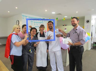 Staff celebrating International Nurses Day with decorations