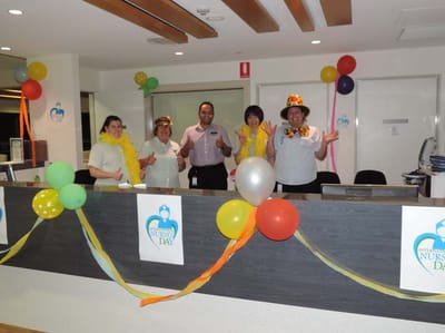 Staff celebrating International Nurses Day at reception