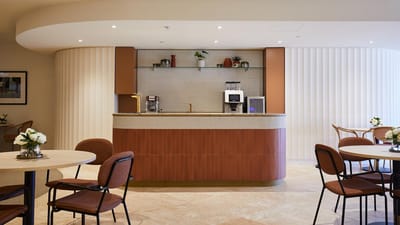Modern common area with a coffee bar and seating