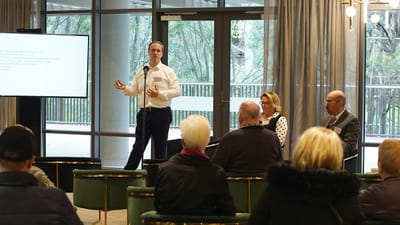 Residents and staff participating in an event in a common area