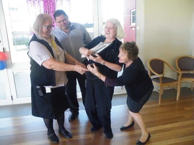 Staff and residents engaging in a fun activity