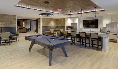 Interior common area with billiards and seating