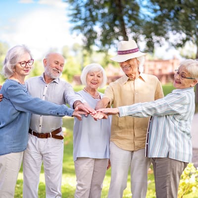 Seniors enjoying a group activity outdoors