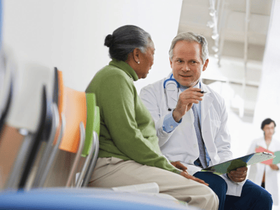 Doctor consulting with a female resident