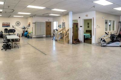 Therapy room with exercise equipment and clean space
