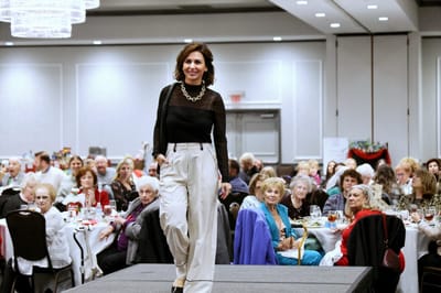 Residents enjoying a fashion show event