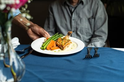 Plate of food served in a dining setting